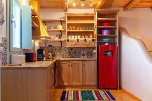 Кухня или мини-кухня в En Pori Houses
