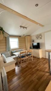 TV a/nebo společenská místnost v ubytování Ma Baie home