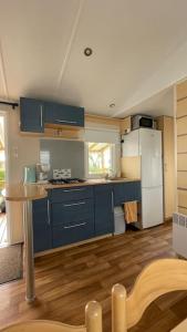 Kuchyň nebo kuchyňský kout v ubytování Ma Baie home