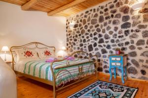 Кровать или кровати в номере En Pori Houses