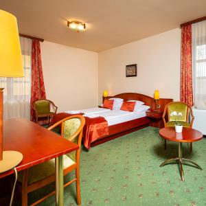 Postel nebo postele na pokoji v ubytování Gastland M0 Hotel & Conference Center + 37 fotografií