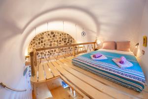 Кровать или кровати в номере En Pori Houses