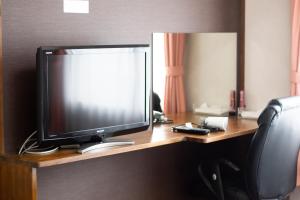 TV a/nebo společenská místnost v ubytování Yamato Saidaiji Hotel SINDAI