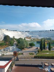 a view of a lake from a roof at Pamukkale Sahin Boutique Hotel in Pamukkale