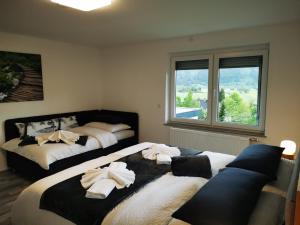 Postel nebo postele na pokoji v ubytování Appartment Jasmin