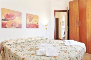 Postel nebo postele na pokoji v ubytování I Sicomori - Seme di Carota - Glamping e appartamenti con piscina a Saturnia