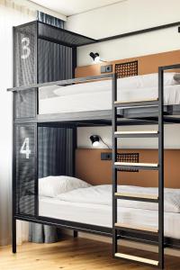 Letto o letti in una camera di H2 Hotel Wien Schönbrunn
