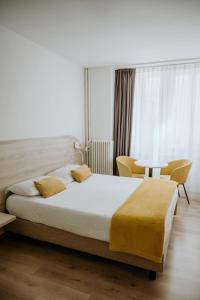 Postel nebo postele na pokoji v ubytování Hotel Venezia
