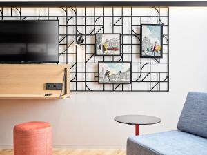 TV o dispositivi per l'intrattenimento presso H2 Hotel Wien Schönbrunn