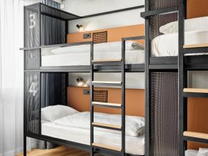 Letto o letti in una camera di H2 Hotel Wien Schönbrunn
