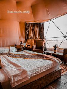Postel nebo postele na pokoji v ubytování sonia luxury camp