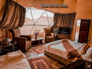 Postel nebo postele na pokoji v ubytování sonia luxury camp