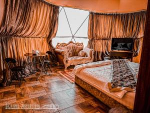 Postel nebo postele na pokoji v ubytování sonia luxury camp