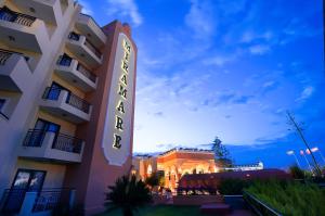 a hotel with a sign in front of it at Miramare Queen Hotel - Ultra All Inclusive in Side +77 photos
