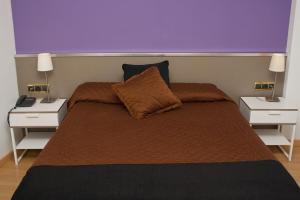 Cama o camas de una habitación en Hotel Abbot