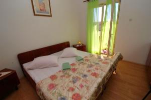 Postel nebo postele na pokoji v ubytování Apartment Domestic
