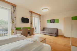 Rúm í herbergi á Hotel Semriacherhof