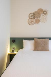 Postel nebo postele na pokoji v ubytování Green Park Hotel Brugge