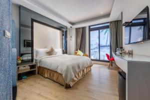 Voodi või voodid majutusasutuse Pacific Inn toas