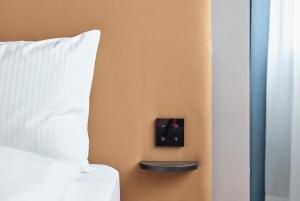 Letto o letti in una camera di H2 Hotel Wien Schönbrunn