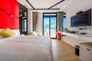 Voodi või voodid majutusasutuse Pacific Inn toas