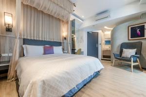 Voodi või voodid majutusasutuse Pacific Inn toas