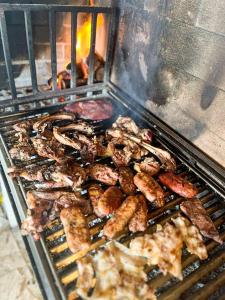 a grill with a lot of food on it at La Staccionata in Arpino