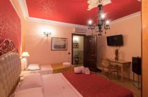 Säng eller sängar i ett rum på Villa Margherita