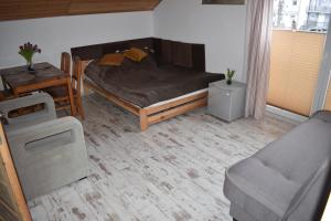 מיטה או מיטות בחדר ב-Villa Rosa pokoje u Marzeny