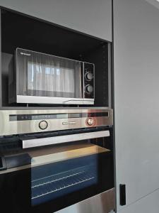 Kuchnia lub aneks kuchenny w obiekcie Apartament Pod Dwójką