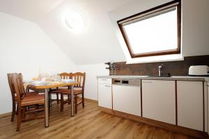 Kuchyň nebo kuchyňský kout v ubytování Zimmer u Apartment in Bad Gams Deutschlandsberg