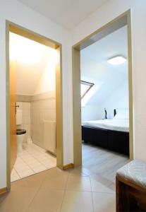 Postel nebo postele na pokoji v ubytování Zimmer u Apartment in Bad Gams Deutschlandsberg
