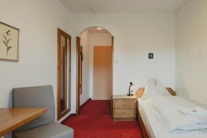 Rúm í herbergi á Hotel Semriacherhof