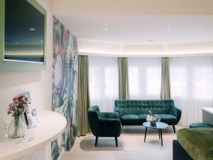 Зона вітальні в Hotel Krone Thun