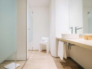 Ванна кімната в Hotel Krone Thun