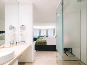 Ліжко або ліжка в номері Hotel Krone Thun