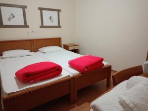 Postel nebo postele na pokoji v ubytování Efstratios Hotel