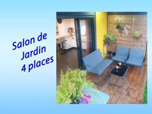 Coin salon dans l'établissement NEW Joli Studio avec Vue mer imprenable - wifi