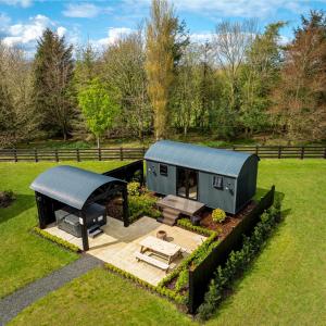 an overhead view of a tiny house in a field at Shepherds Huts at Ballyness Farm in Dungiven