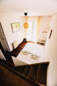 Postel nebo postele na pokoji v ubytování Loredo Surf House