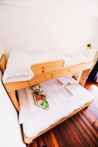Postel nebo postele na pokoji v ubytování Loredo Surf House