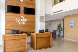 an office with a sign that reads sleep inn at Sleep Inn Hermosillo in Hermosillo