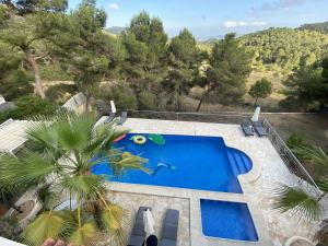 Utsikt över poolen vid Villa Can Pere Joan eller i närheten