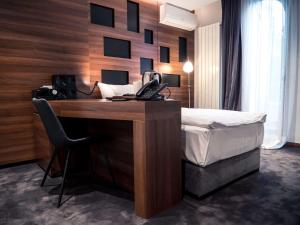 Postel nebo postele na pokoji v ubytování Best Western Premier Natalija Residence