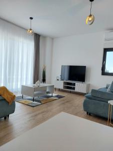 TV a/nebo společenská místnost v ubytování Holiday house Miki