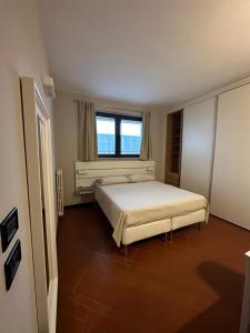 Säng eller sängar i ett rum på R79 - Business Apartment & Long Term Welcome