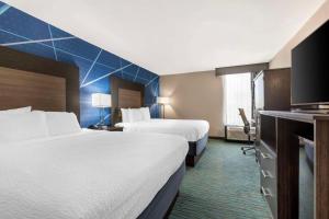 Postel nebo postele na pokoji v ubytování Comfort Inn Dallas North Love Field Airport