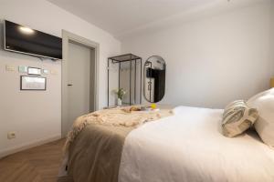Gulta vai gultas numurā naktsmītnē Makarska City Bay Studios