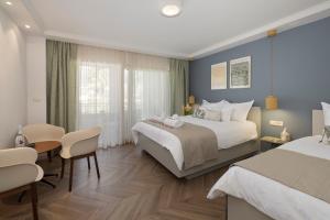Gulta vai gultas numurā naktsmītnē Makarska City Bay Studios