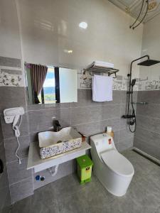 Koupelna v ubytování Khu nghỉ dưỡng View Triệu Mây + 28 fotografií